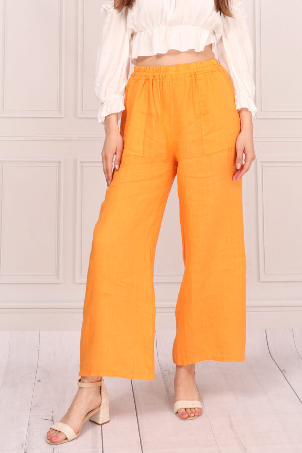 Damskie pomarańczowe luźne spodnie lniane z kieszeniami