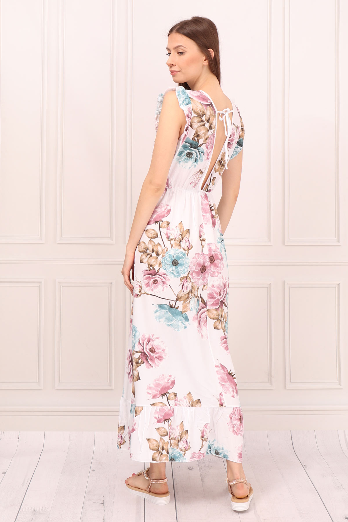 Śmietanowa sukienka letnia maxi w kwiaty wiązana na plecach